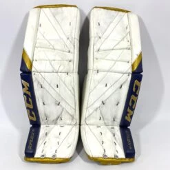 CCM Extreme Flex 5 - Used NCAA Pro Stock Goalie Pads (White/Blue/Gold)