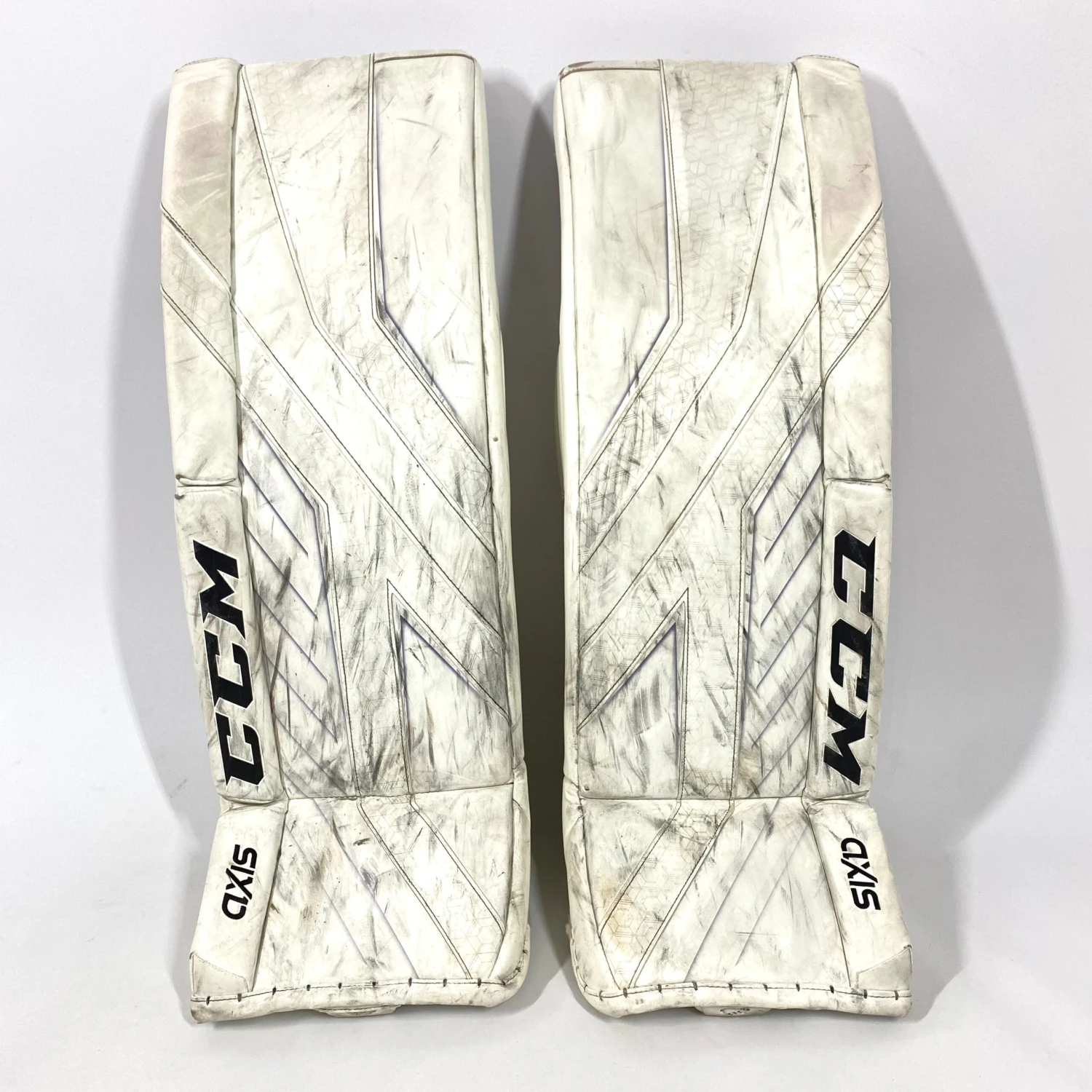 CCM AXIS - Used Pro Stock Goalie Pads (White) 1 CCM AXIS - Used Pro Stock Goalie Pads (White)